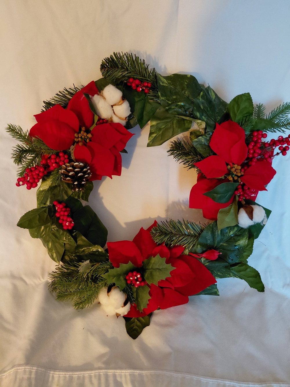 Festive Red Poinsettia and Greenery Holiday Wreath